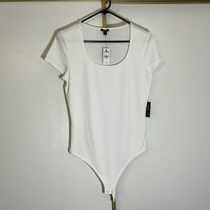 NWT Express white short sleeve body suit. Double lined front size M